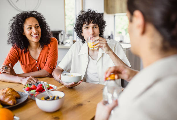 istock Mother and sons having breakfast together 1400070488