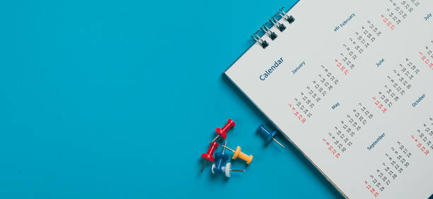 istock Close top view on white calendar 2022 month schedule Work planning and life concept. 1400070592