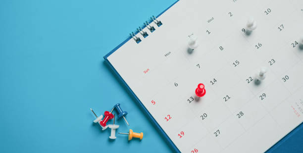 istock Close top view on white calendar 2022 month schedule Work planning and life concept. 1400070614