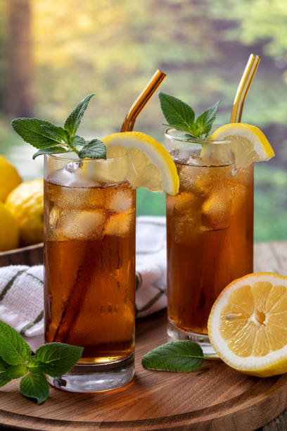istock Two glasses of ice tea with lemon and mint 1400070707