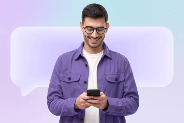 istock Young happy smiling man chatting on phone with speech bubble 1400072492