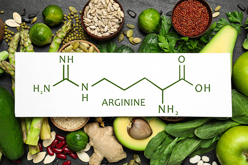 Different vegetables, seeds and fruits on black table, flat lay. Sources of essential amino acids