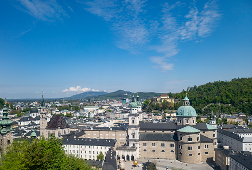 Salzburg, Austria on a bright spring morning.  In the background is the river and in the foreground the Salzburg Cathedral.