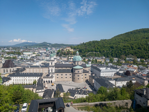 Salzburg, Austria on a bright spring morning.  In the background is the river and in the foreground the Salzburg Cathedral.