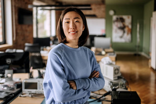 istock Young woman posing in the office 1400075191