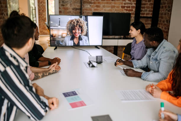 istock Hybrid office meeting 1400075447