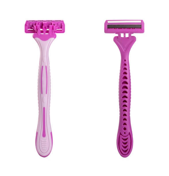 flat shot female disposable razors isolated on white background flat shot female disposable razors isolated on white background. razor blade stock pictures, royalty-free photos & images