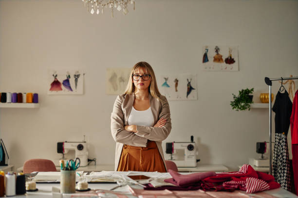 istock Beautiful female designer at design studio 1400077961