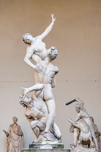 Marble sculptures in the Loggia dei Lanzi in the Piazza della Signoria in Florence: in foreground the 'Rape of the Sabine Women', masterpiece by Giambologna dated 1574-1580