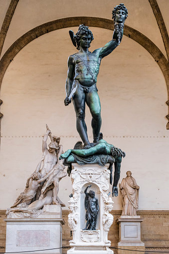 Sculptures in the Loggia dei Lanzi in the Piazza della Signoria in Florence: in foreground the 'Perseus with the Head of Medusa', a bronze sculpture by Benvenuto Cellini dated 1545–1554