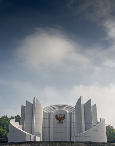 Bandung, Indonesia- May 10th 2022 : Indonesian national symbols or emblems in Monument of Struggle (Fighting Monument), in Bandung. The emblem is showing Indonesia national motto Unity in Diversity , Bhineka Tunggal Ika,