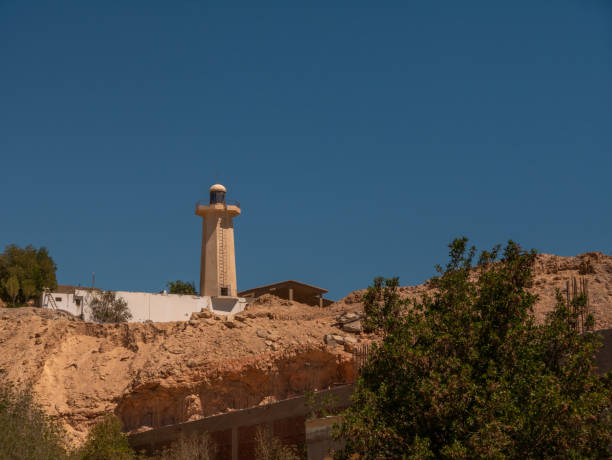 istock Lighthouse on a high mountain on a sunny day with blue sky. 1400080464