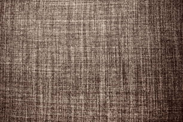 brown background fabric texture. a piece of woolen cloth is neatly laid out on the surface. weave and textile texture. dress fabric or for kitchen needs, tablecloth or curtains, close-up. dash. - seam macro rough striped imagens e fotografias de stock