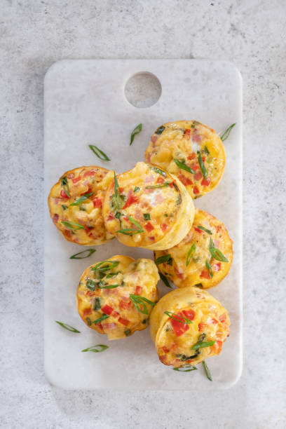 istock Egg muffins with ham, cheese and vegetables 1400081881