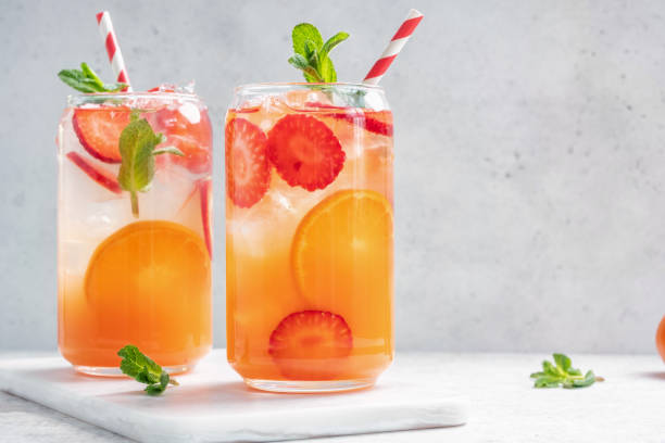 istock Orange cocktail with strawberries, summer drink 1400081957