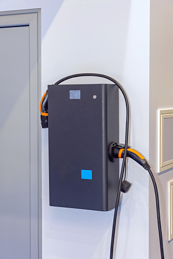 Wall Mounted Electric Car Charger in Garage