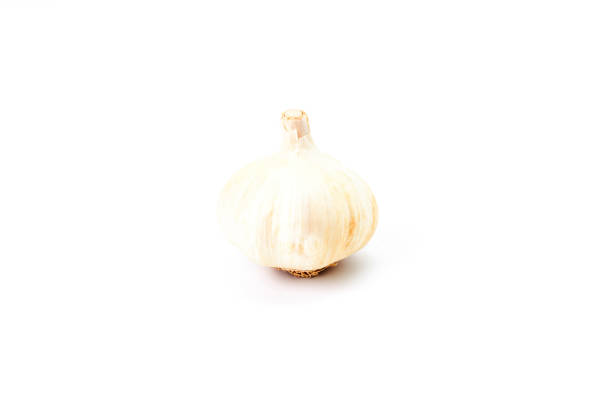 Garlic head on a white background. Vegetarian food. Ecological food