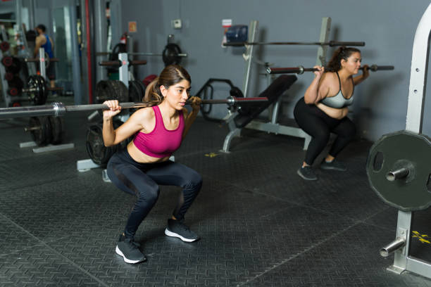 istock Female trainer teaching a new workout 1400083894