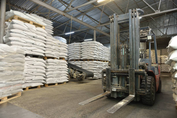 istock Forklift in a warehouse with wheat in sacks 1400084211