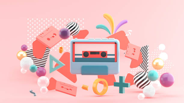 le magnétophone est entouré de ruban adhésif coloré et de boules sur fond rose.-rendu 3d. n - personal cassette player photos et images de collection