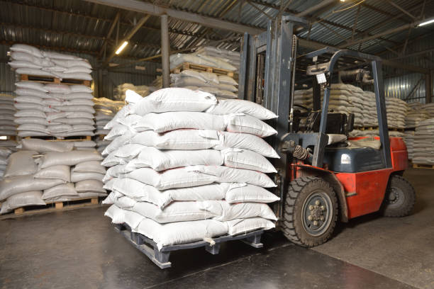 istock Forklift in a warehouse with wheat in sacks 1400085097