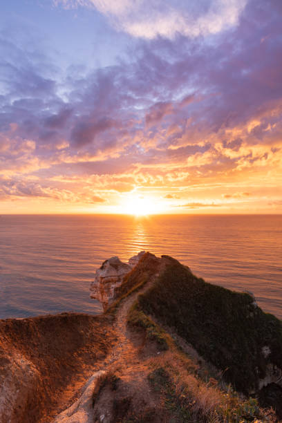 istock Incredible sunset on the cliffs of Etretat 1400085106