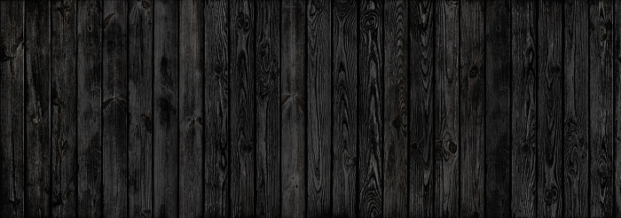 black weathered wooden planks with paint flakes