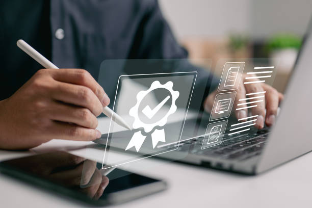 istock top-quality service guarantee and ISO certification and standardization idea emblazoned on the shoulders of a businessman 1400087189