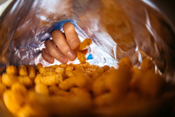 Young Man Eating Flips From The Bag's POV