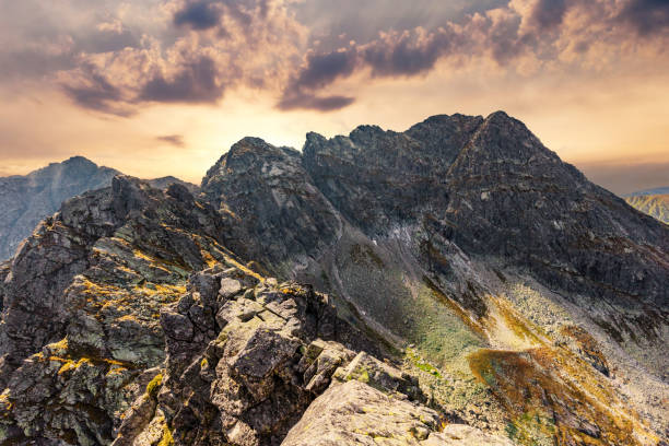 Mountains landcape at sunset. Tatra mountains Mountains landcape at sunset. View from Koscielec peak in Tatra mountains, Poland. high tatras stock pictures, royalty-free photos & images