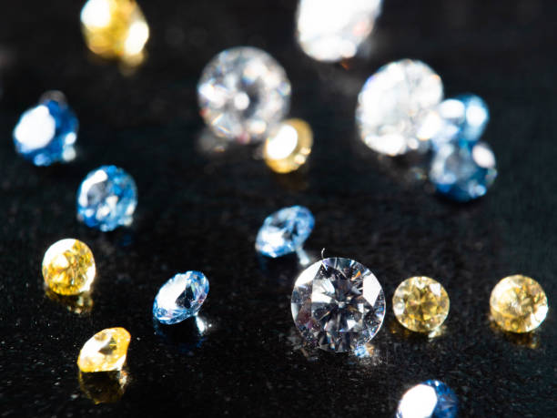 istock Close up shot of group multi colors diamond on a black background 1400095011
