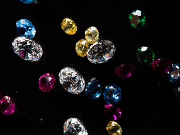 istock Close up shot of group multi colors diamond on a black background 1400095018