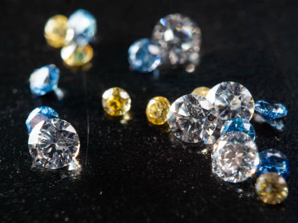 istock Close up shot of group multi colors diamond on a black background 1400095019