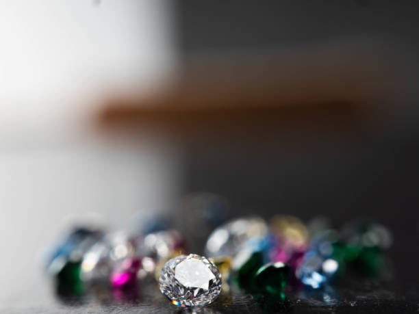 istock Close up shot of group multi colors diamond on a black background 1400095114