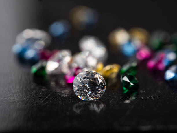 istock Close up shot of group multi colors diamond on a black background 1400095167