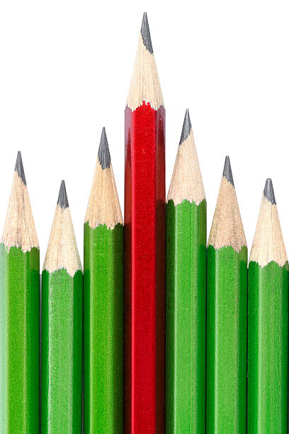 istock One pencil stands out from other 140009845