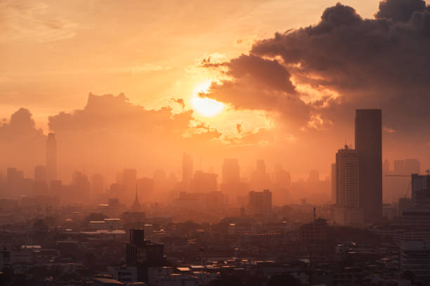 Sunrise over high rise building in business district at Bangkok city Beautiful sunrise over high rise building in business district at Bangkok city, Thailand bangkok city sunrise stock pictures, royalty-free photos & images