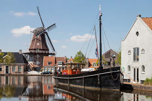 Windmill along the canal in the center of the city of Meppel in the Netherlands.