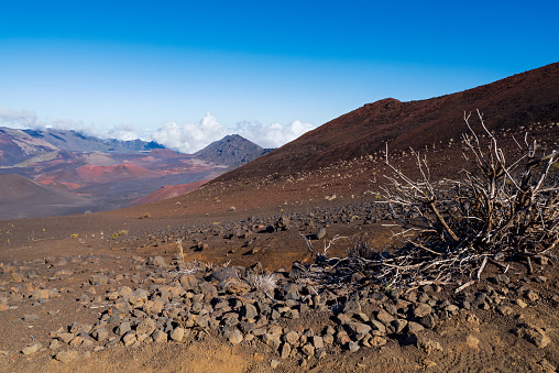 barren slopes of haleakala crater with cinder cones in valley along sliding sands trail at haleakala national park maui hawaii