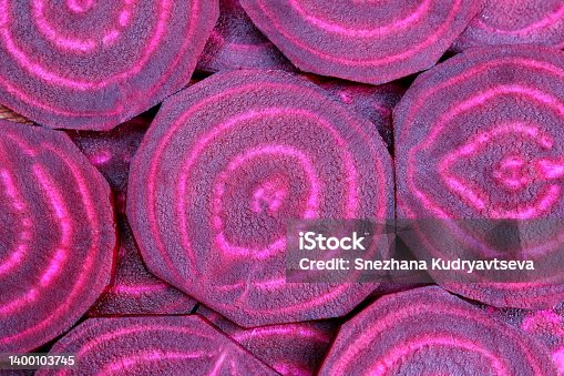 istock Background of red sliced beets. 1400103745
