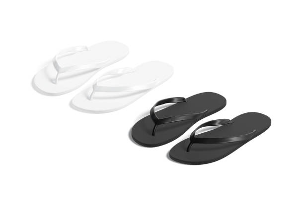 istock Blank black and white beach slippers mockup, side view 1400103748