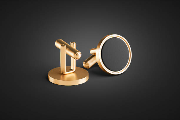 Blank round gold cufflinks toggle with black label mockup pair Blank round gold cufflinks toggle with black label mockup pair, 3d rendering. Empty classic circle cuff-link mock up, side view, dark background. Clear buckle brooch or clutch accessory template. cufflink stock pictures, royalty-free photos & images