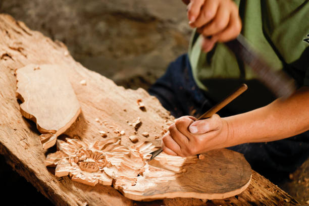 istock Engraving and creation by a senior disability woodcarver 1400106859