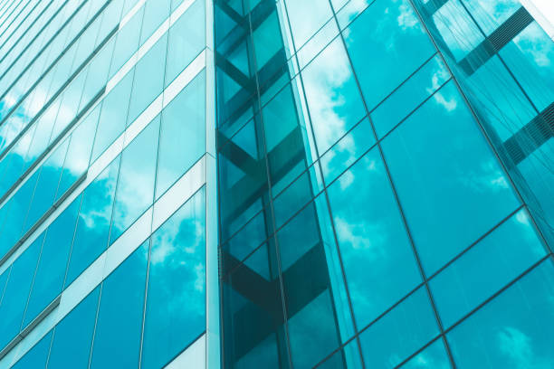 istock underside panoramic and perspective view to steel blue glass high rise building skyscrapers 1400109280