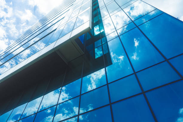 istock underside panoramic and perspective view to steel blue glass high rise building skyscrapers 1400109556