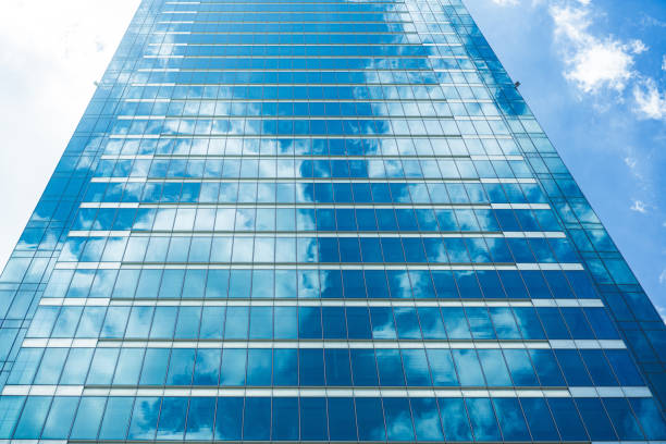 istock underside panoramic and perspective view to steel blue glass high rise building skyscrapers 1400109623