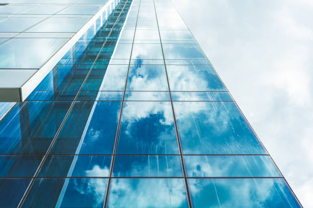 istock underside panoramic and perspective view to steel blue glass high rise building skyscrapers 1400109675