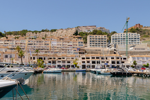 LA HERRADURA, SPAIN - 17 MAY 2022 The Marina del Este port, in a very beautiful natural and privileged position between the mountains and the sea, serves 227 berths with a maximum length of 35 meters