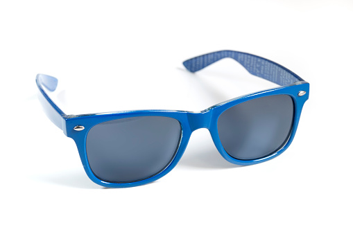 blue sunglasses with smoked lenses on white background