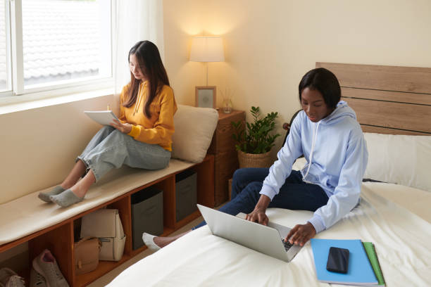 istock Girls Studying in College Dormitory, 1400118555